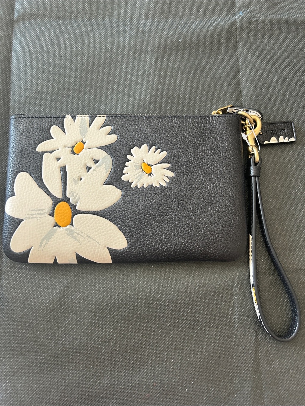 Coach Black Wristlet Clutch with White Daisy Motif